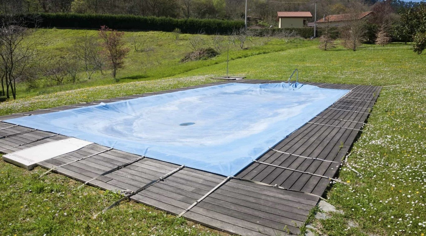 Pool with protective cover for seasonal closing service in Norwalk, CA